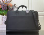 Leather briefcase bag in dark charcoal, front view with top handle and shoulder strap