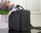 Leather briefcase bag in dark charcoal, side view with shoulder strap and clasp