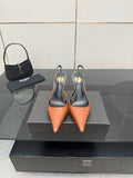 Ladies' YSL two-tone orange-and-black pointed-toe pumps with stiletto heels