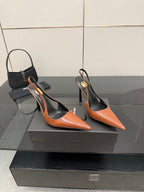 Ladies' YSL orange-and-black pointed-toe slingback pumps with stiletto heels