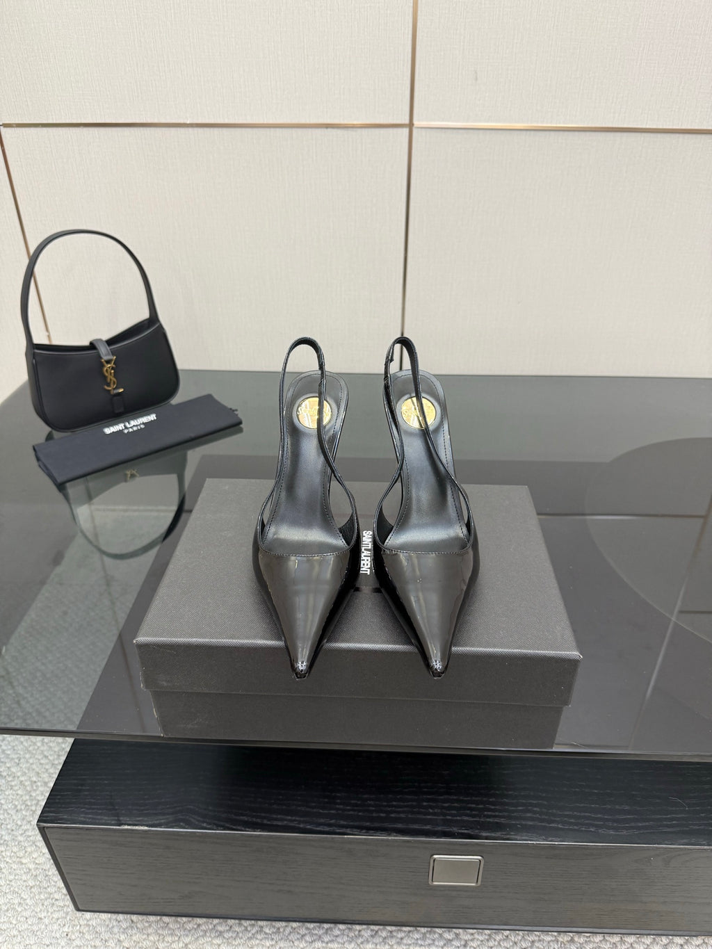 YSL women’s black slingback stiletto heels with glossy toe, pointed tip