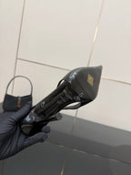 YSL women’s black slingback stiletto heel, close-up of heel back and strap