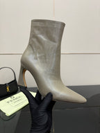 Fendi women’s ankle boot close-up, silver-gray leather, curved toe and block heel