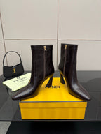 Fendi ladies ankle boots pair, dark leather with side zipper and slim heel