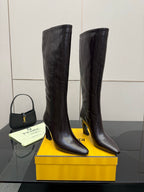 Pair of ladies tall leather boots, dark with block heels, pointed toes