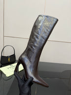 Ladies tall dark leather boot with slim heel and pointed toe