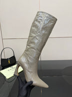 Single tall gray leather knee-high boot, pointed toe and stiletto heel
