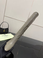 Tall gray leather knee-high boot with pointed toe and stiletto heel