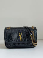 YSL black leather shoulder bag with gold YSL logo, flap and chain strap