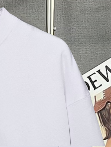 Moncler white sweatshirt shoulder and side seam detail.