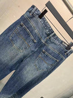 Balenciaga denim pants with back patch pockets, medium-to-dark blue wash
