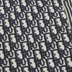 Dior monogram fabric texture in black and cream repeating pattern