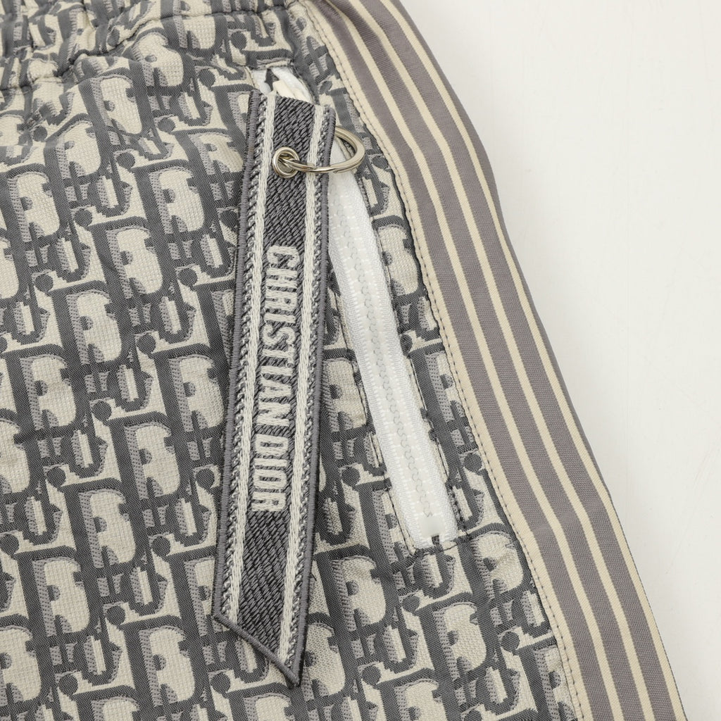 Dior monogram pants side detail with metal eyelet and drawstring tie