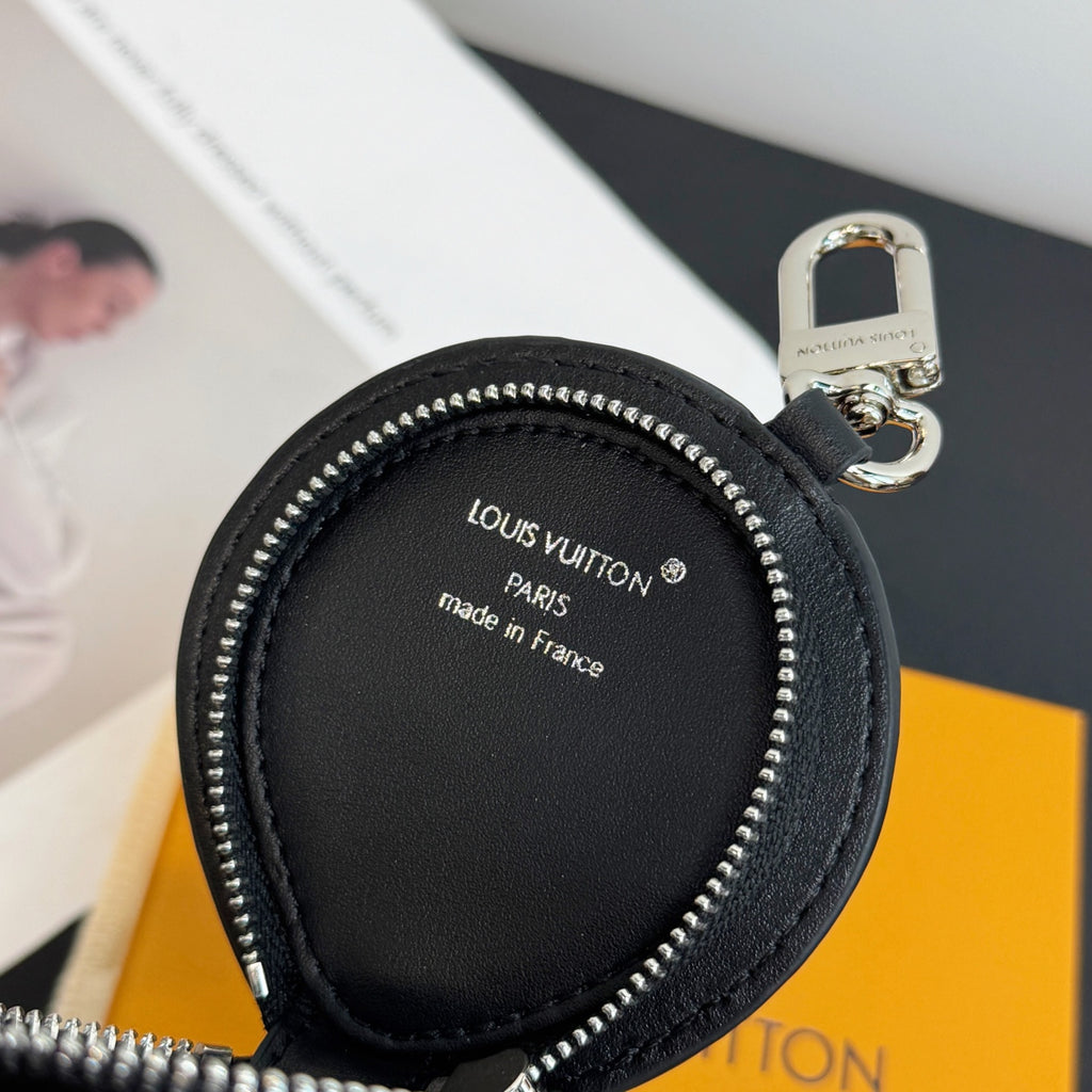 Louis Vuitton round leather zip pouch with Paris made in France label