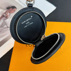 Louis Vuitton round zip key pouch interior with zipper detail and leather label