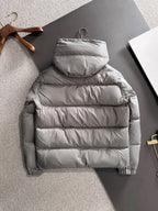Gray quilted hooded puffer jacket with standing collar and front zipper