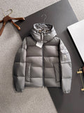 Gray hooded puffer jacket with full-length zipper and quilted front panels