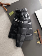 Gucci padded jacket in black with hood and logo stripe detail