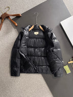 Gucci padded jacket in black with front zip and raised collar