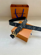 Louis Vuitton monogram belt with gold-tone buckle and dark patterned strap