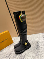 Louis Vuitton unisex black leather knee-high boot with circular LV charm keychain