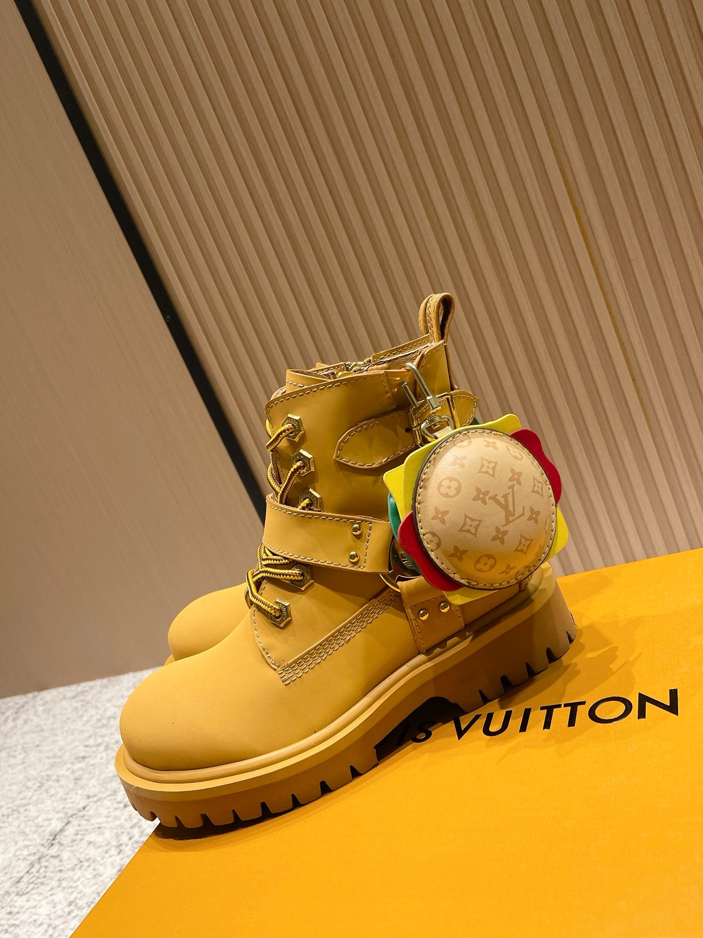 Louis Vuitton unisex yellow ankle boots with buckle straps and round LV coin pouch
