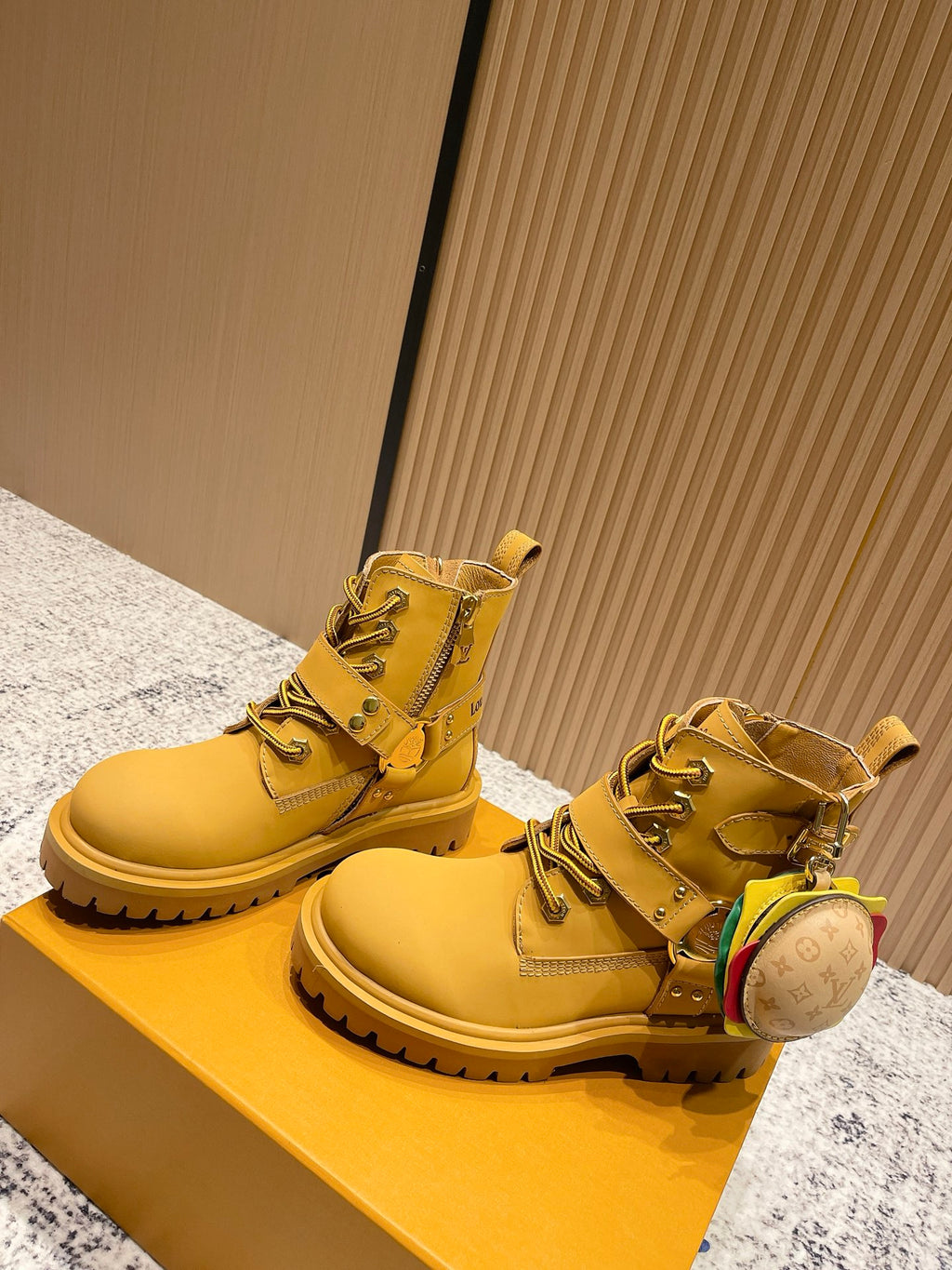 Louis Vuitton unisex yellow lace-up boots with small multicolor strap detail on box