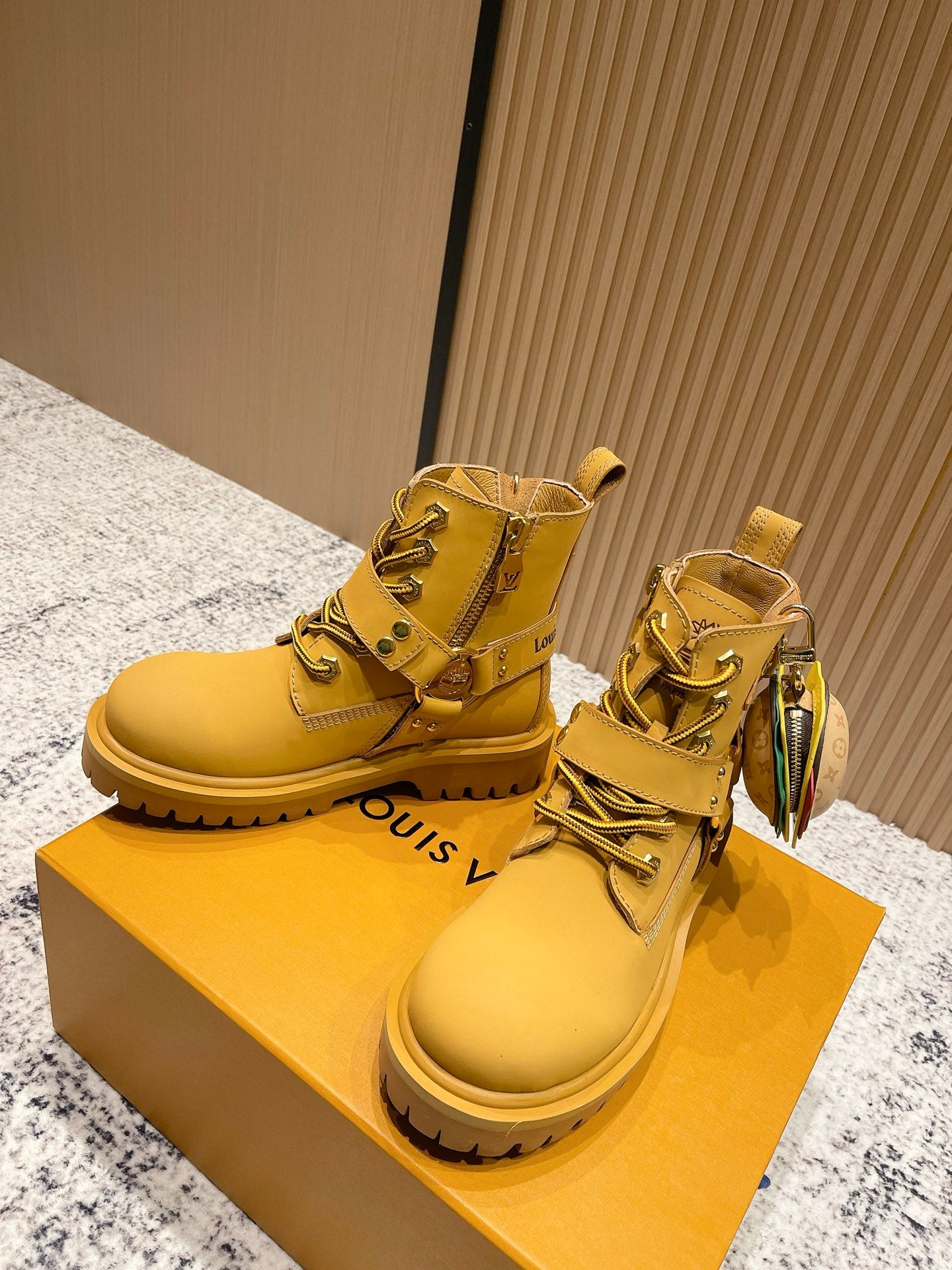 Louis Vuitton unisex yellow lace-up boots with side straps and chunky treaded sole
