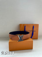 Brown leather belt with gold-tone LV buckle and black reverse side