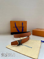 Brown leather belt with gold-tone LV buckle, laid coiled