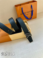 Louis Vuitton leather belt with dark blue straps and gold LV buckle, shown opened