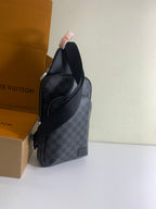 Louis Vuitton damier crossbody bag with dark strap and side profile