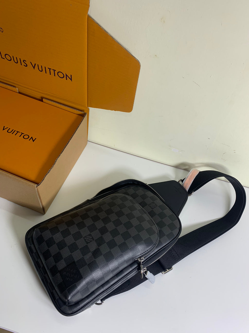 Louis Vuitton shoulder bag with Damier check pattern, curved shape and adjustable strap