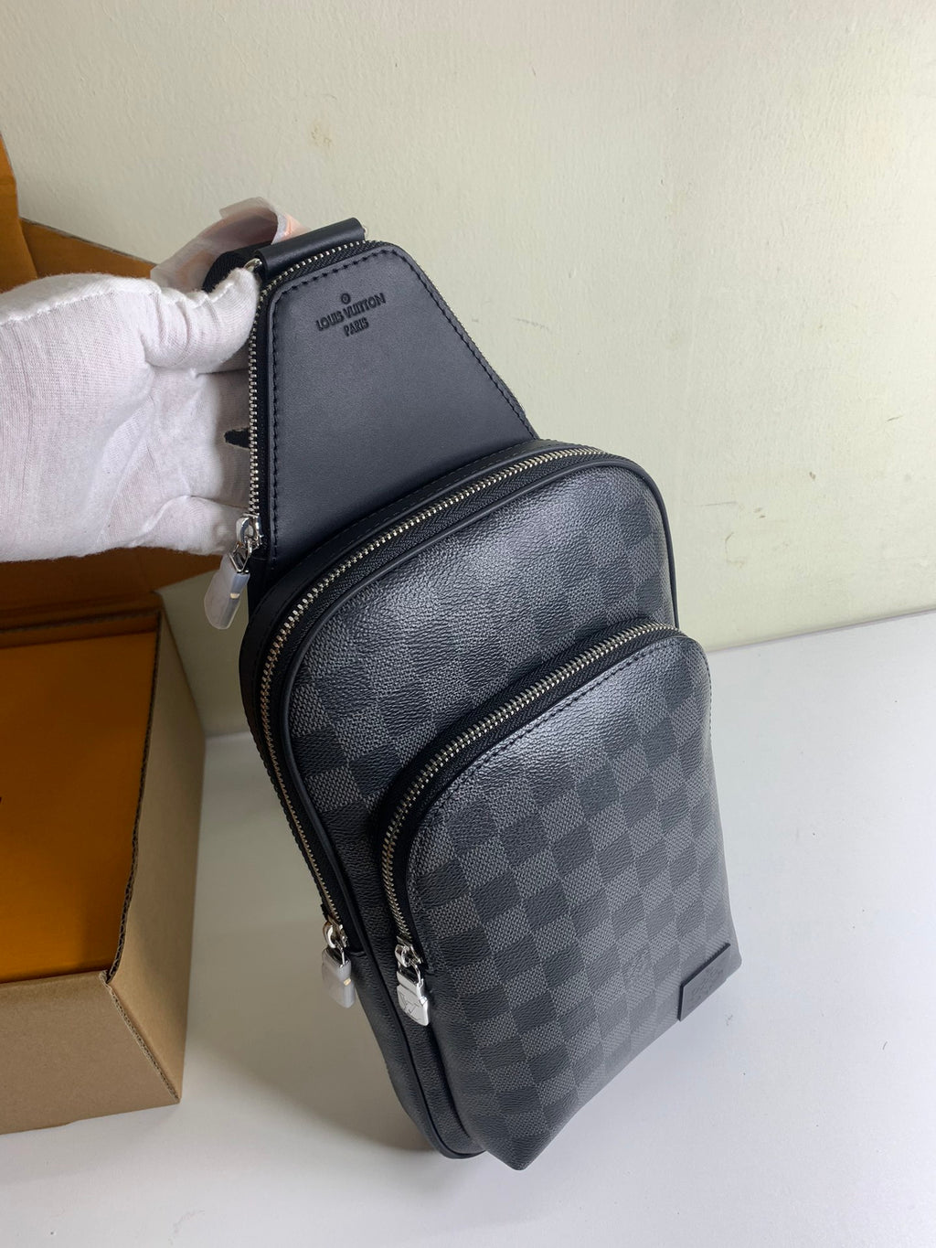 Louis Vuitton damier crossbody bag, dark checker pattern and zip front pocket