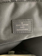 Louis Vuitton interior label reading LOUIS VUITTON PARIS made in France
