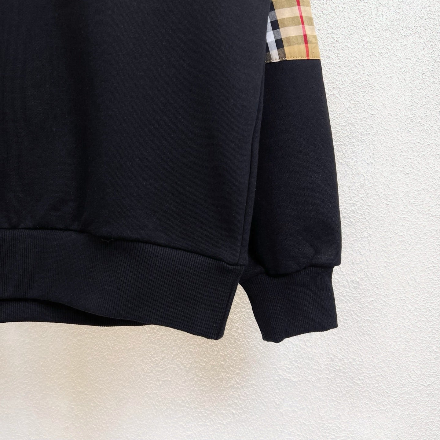 Black Burberry sweatshirt with ribbed hem and matching cuffs