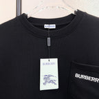 Black Burberry sweatshirt neckline detail with hanging size label