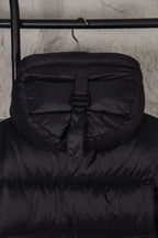 Long puffer coat front with zipper and drawstring waist, dark fabric