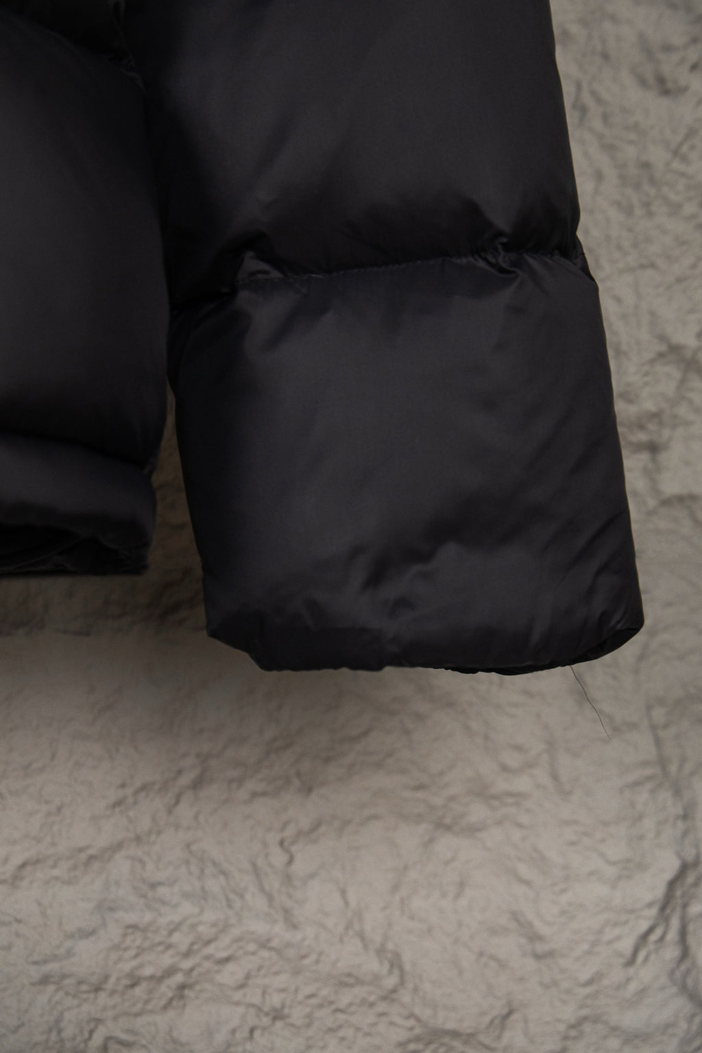 Long puffer coat cuff with elastic hem, dark fabric