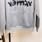 Gray Louis Vuitton hoodie front with black text graphic across chest and large pouch pocket.