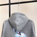 Gray Louis Vuitton hoodie back hood with multicolor lightning graphic and drawstrings.