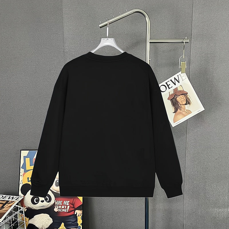 Black Moncler long-sleeve top front view with circular logo graphic at chest