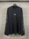 Balenciaga long-sleeve T-shirt, dark with white chest logo and printed sleeves