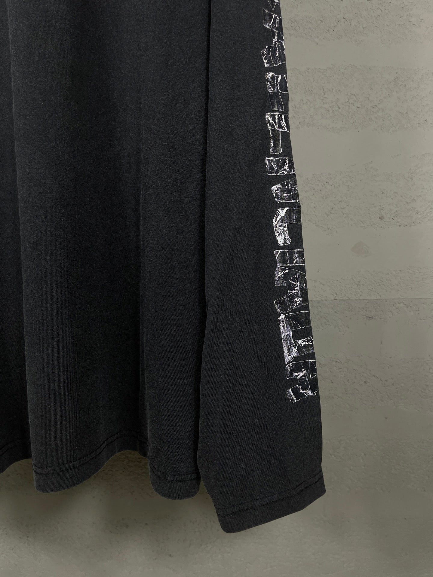 Balenciaga long-sleeve T-shirt lower back, dark with printed sleeve panel
