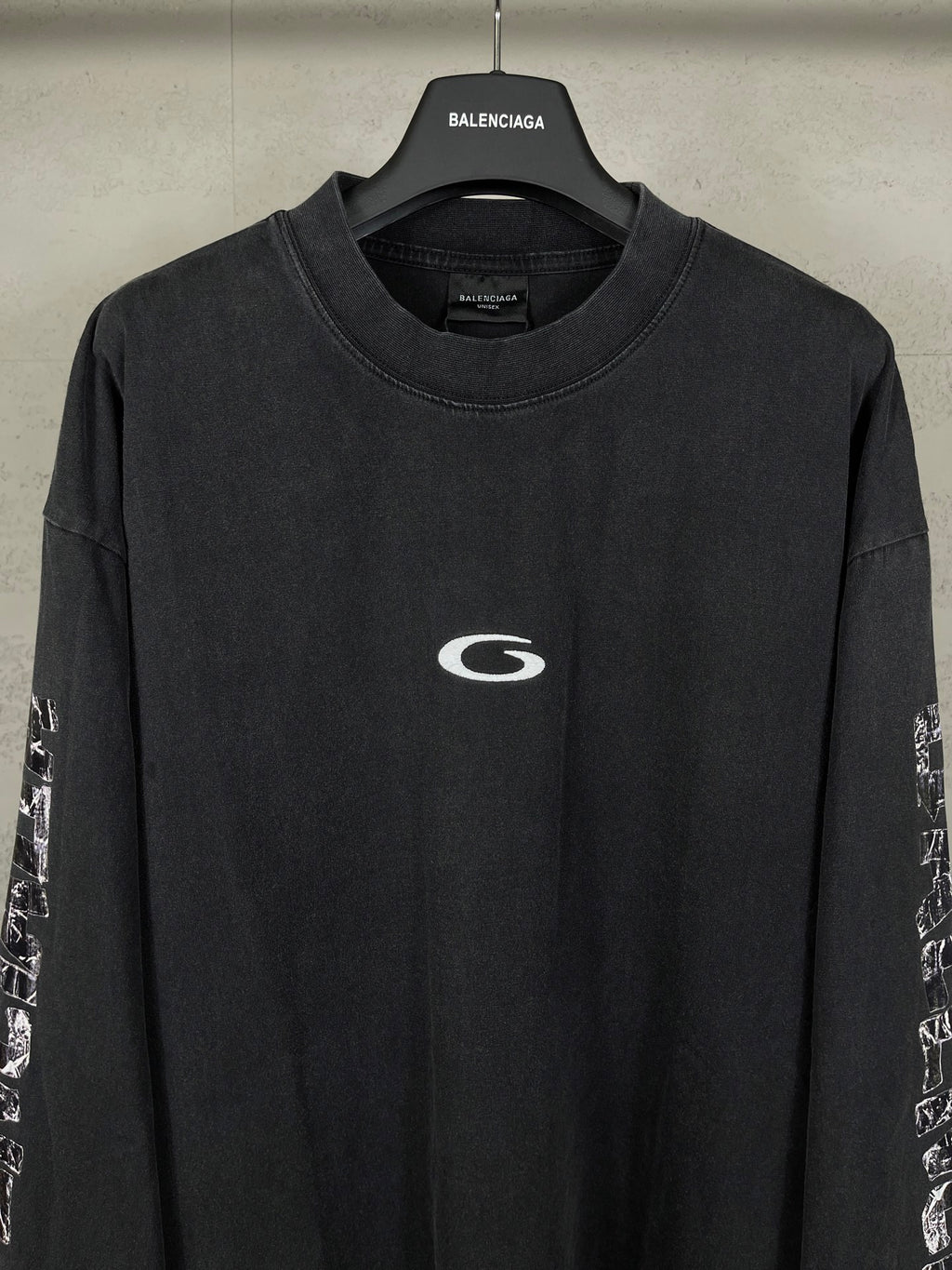 Balenciaga long-sleeve T-shirt, dark with white chest logo and printed sleeve panels