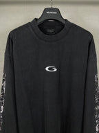 Balenciaga long-sleeve T-shirt, dark with white chest logo and printed sleeve panels