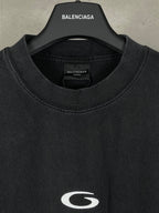Balenciaga long-sleeve T-shirt neckline, dark jersey with white chest logo