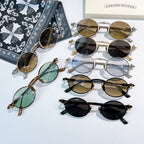 Chrome glasses set with mixed round frames and tinted lenses, arranged in a spread view.