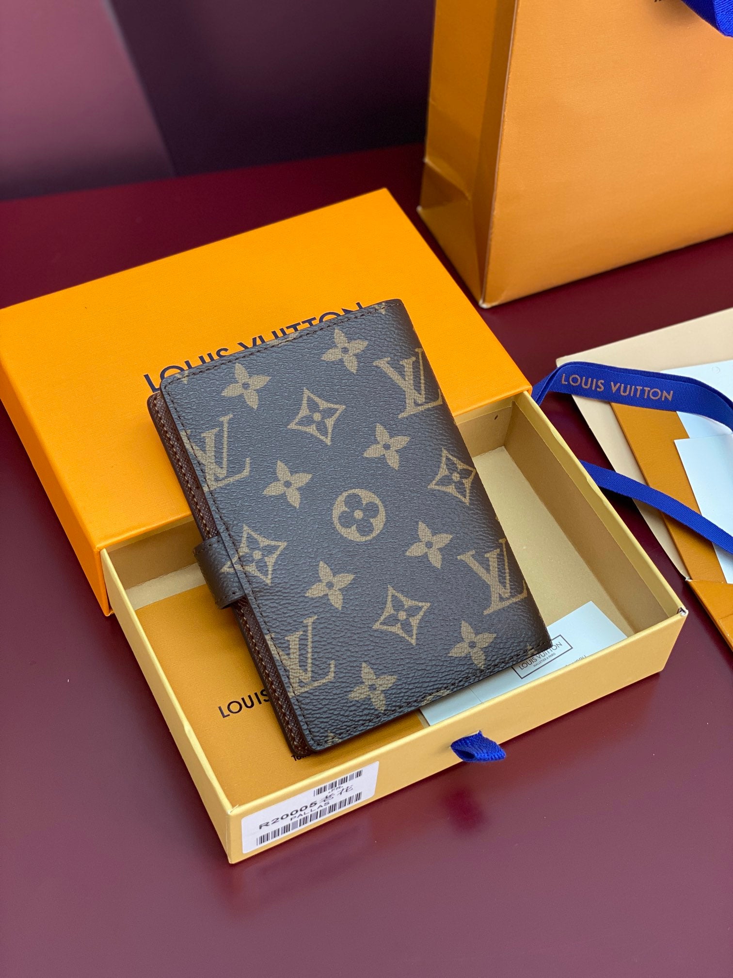 Brown Louis Vuitton monogram small bag with front flap and gold-tone snap