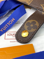 Louis Vuitton monogram small bag, dark brown with gold snap and front stud